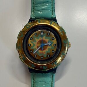 Swatch Turquoise Strap Watch with Gold Bezel and Sunburst Dial scuba 1998